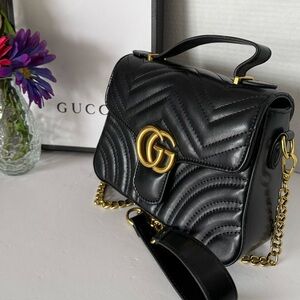 Gucci Black Mini Bag with Gold Accents